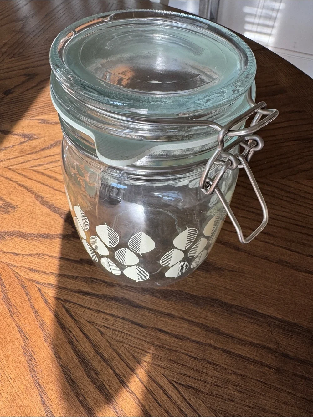 IKEA Glass Airtight Canister with Cream Leaf Pattern and Clear Glass